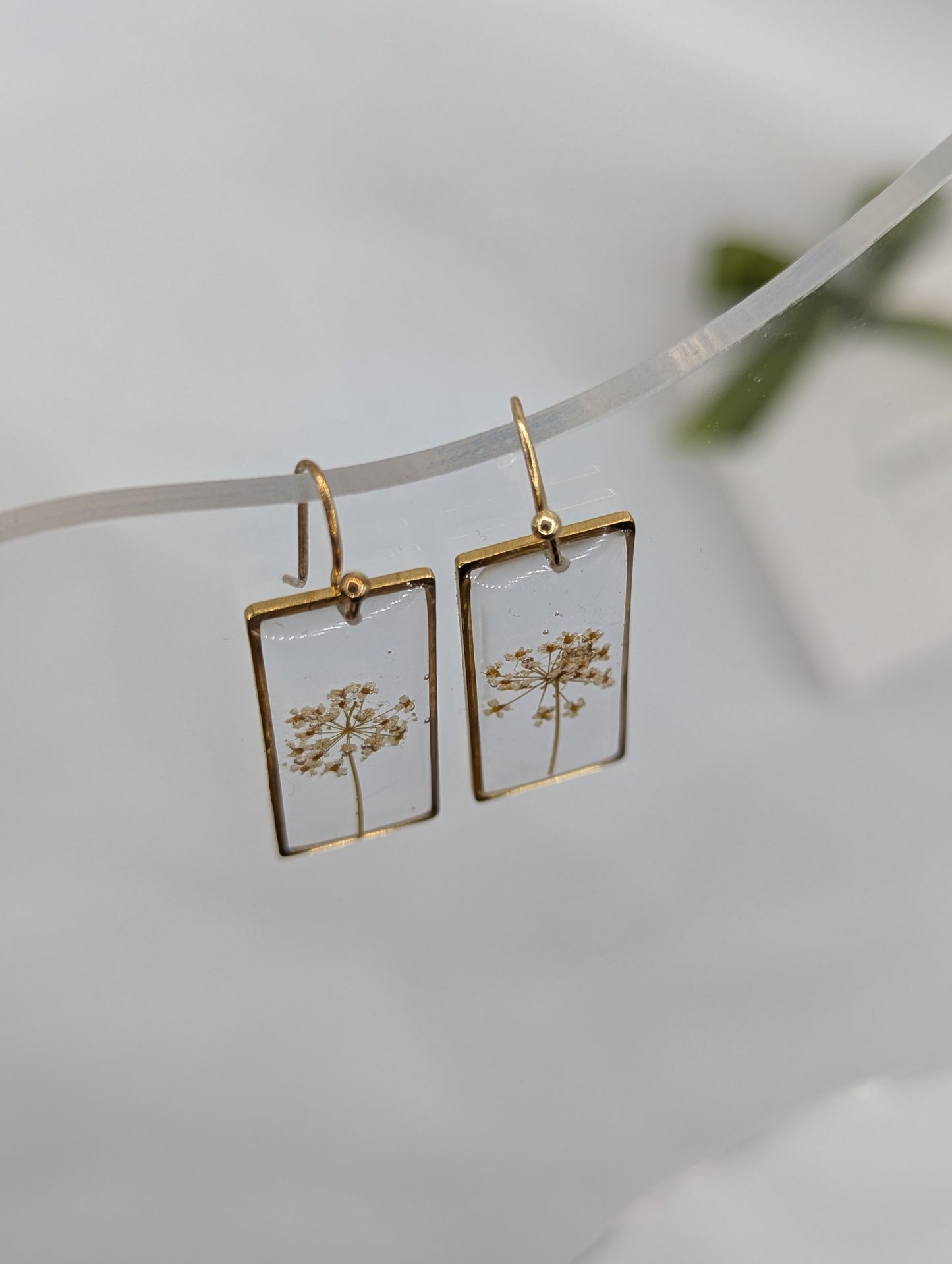 rectangular shape feturing white flower