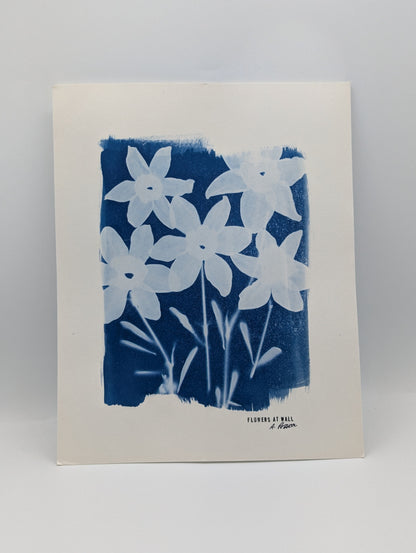 Art print with blue floral design on a white background