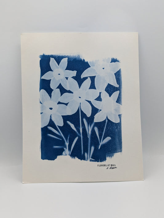 Art print with blue floral design on a white background