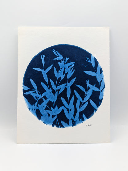 Art print with blue botanical design on a white background