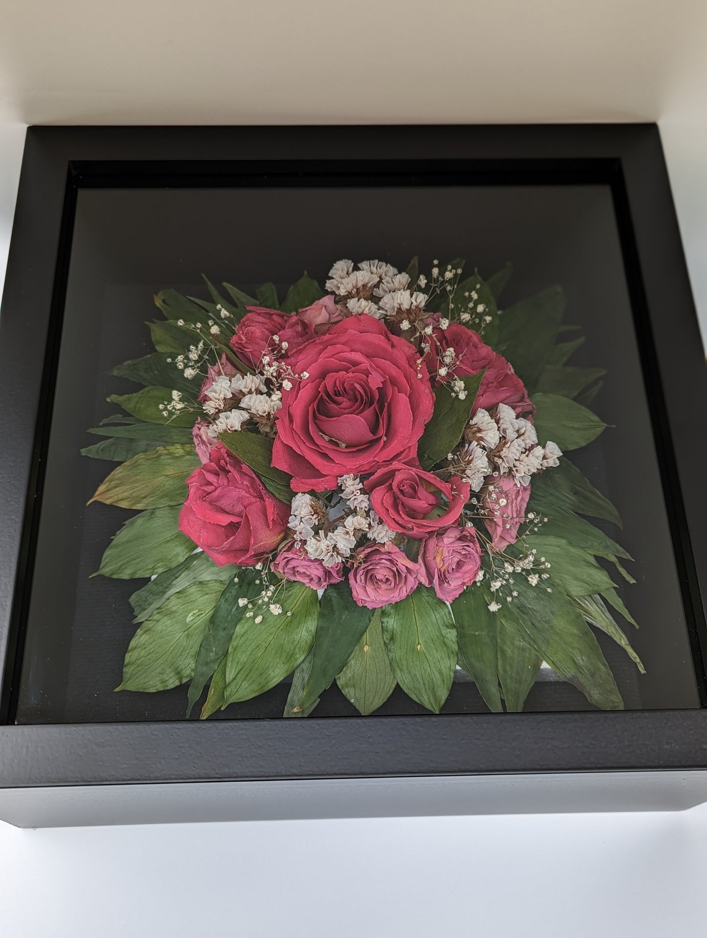 roses in shadow box, preserved wedding bouquet
